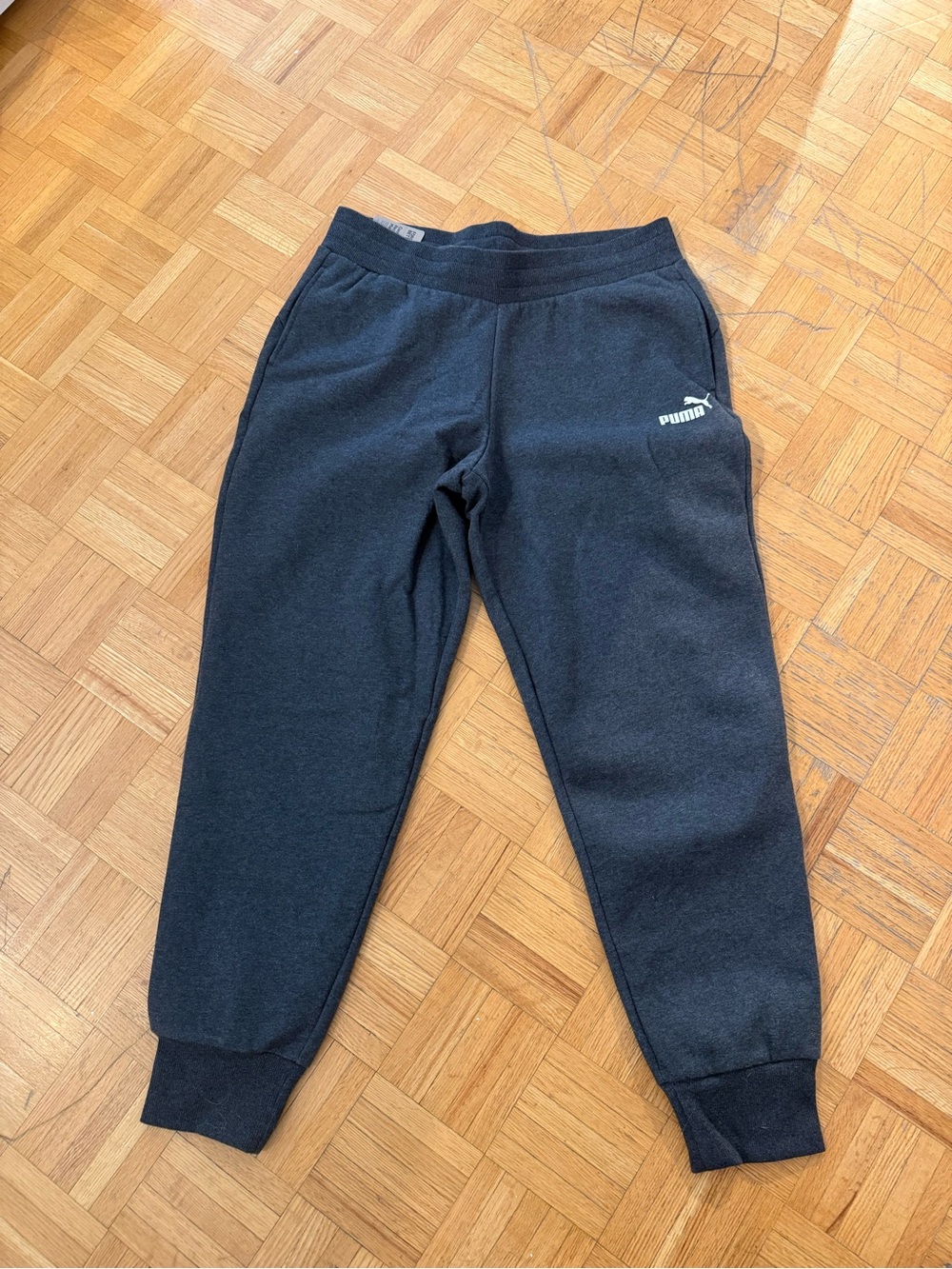 Puma Women’s charcoal Fleece Jogger Pants- size L- New With Tags